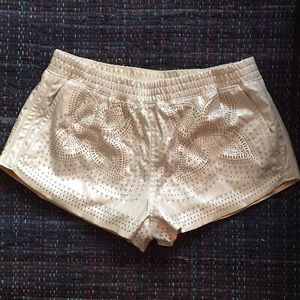 White leather-like mini shorts